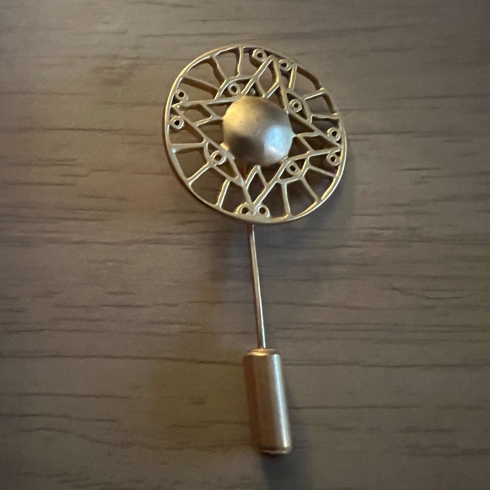 Gold tone trivet filigree hat pin by INCA, vintage